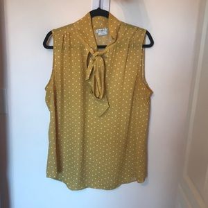 Yellow polka dot sleeveless blouse